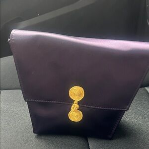 Elegant Purple Clutch with Gold Accents